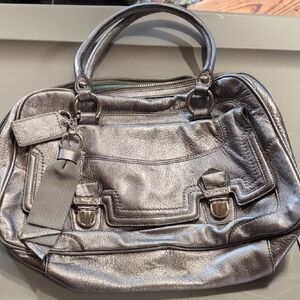 Coach Metallic Silver Shoulder Bag with Soft Material and Rolled Handles